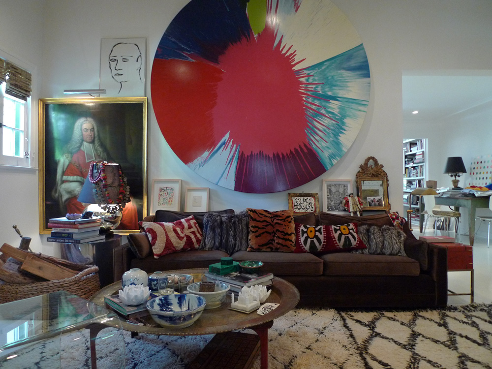Hartig's eclectic living room features a Damien Hirst spin painting 